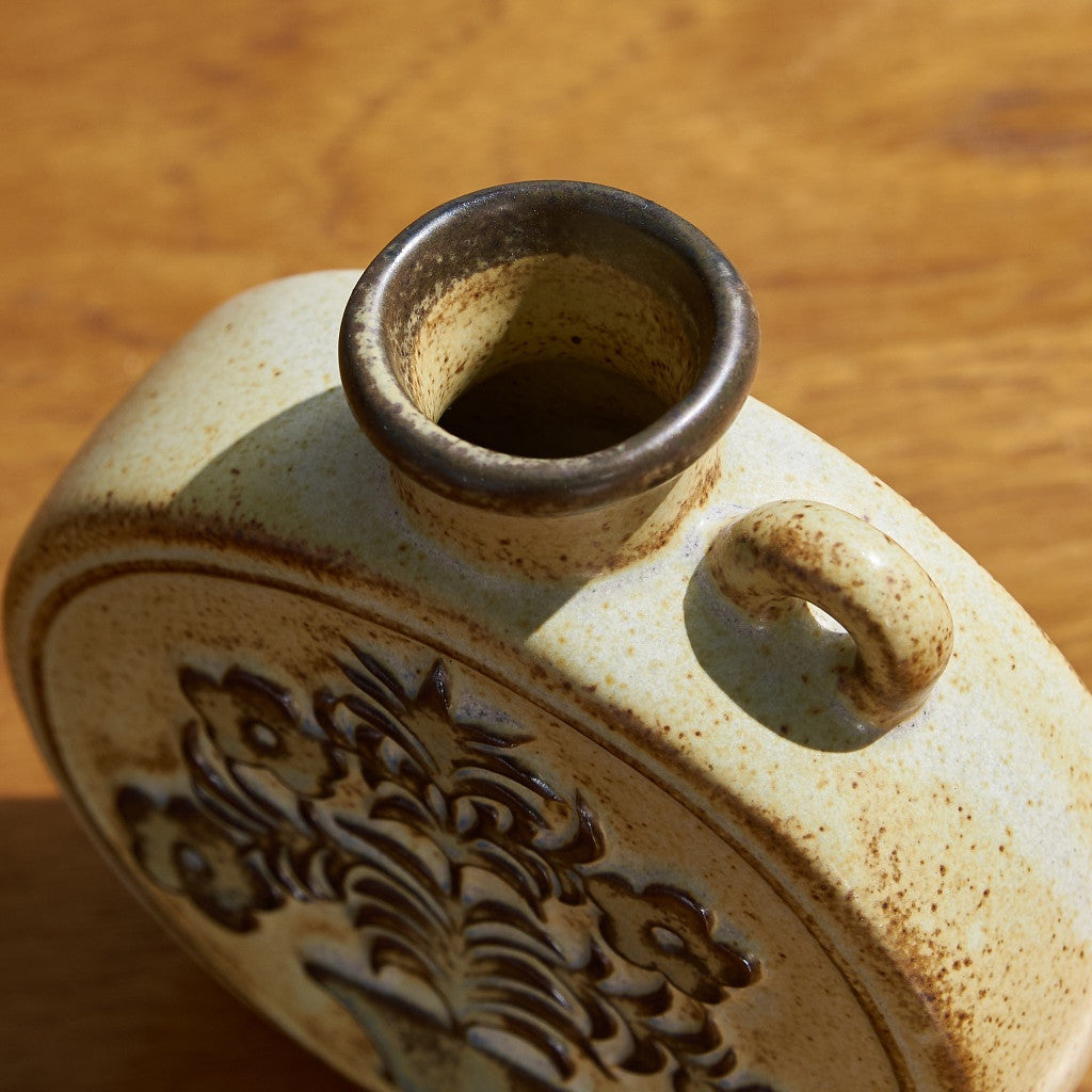 With a grip round Vase